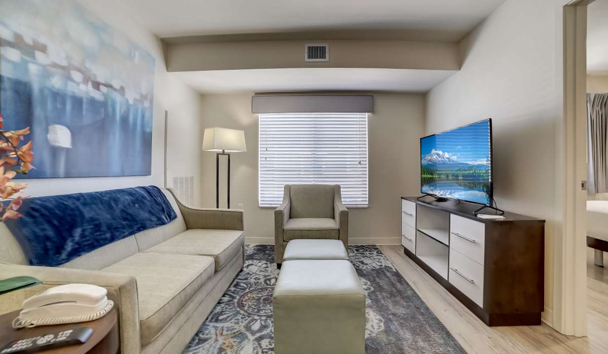 Living space with large TV Simplicity at the Rim in San Antonio, Texas