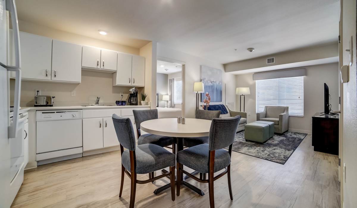 Dining room with gray chairs Simplicity at the Rim in San Antonio, Texas