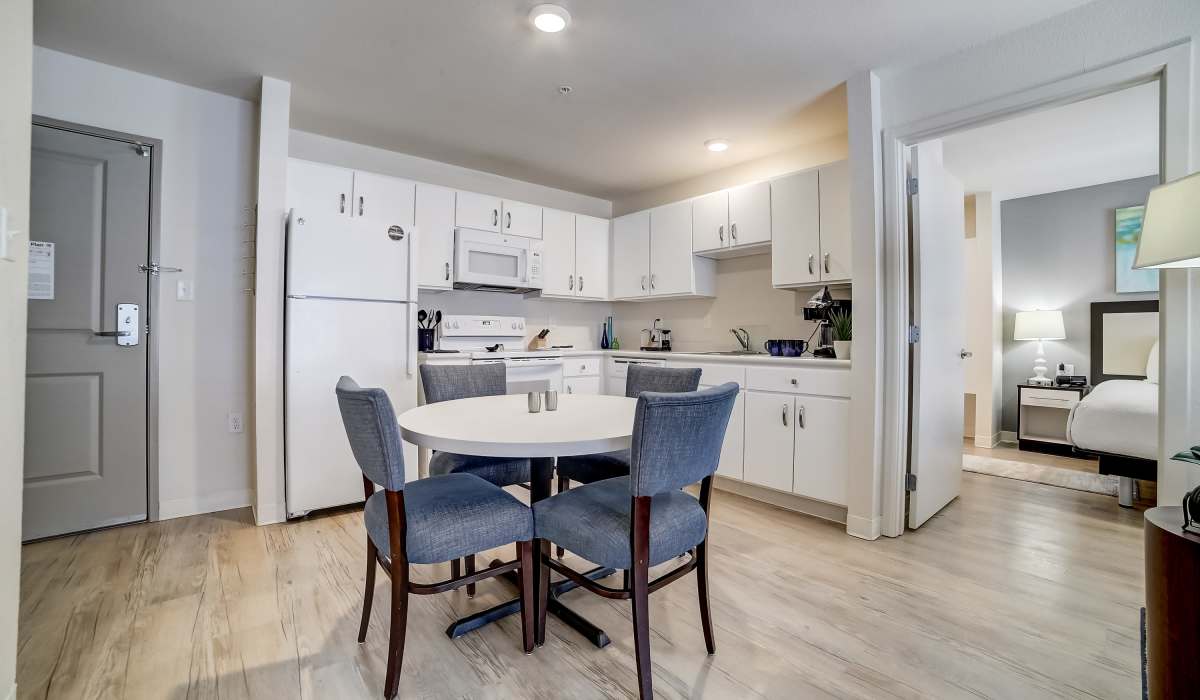 Kitchen with dining table Simplicity at the Rim in San Antonio, Texas
