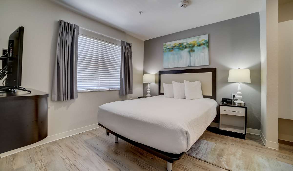 Bedroom with accent wall Simplicity at the Rim in San Antonio, Texas
