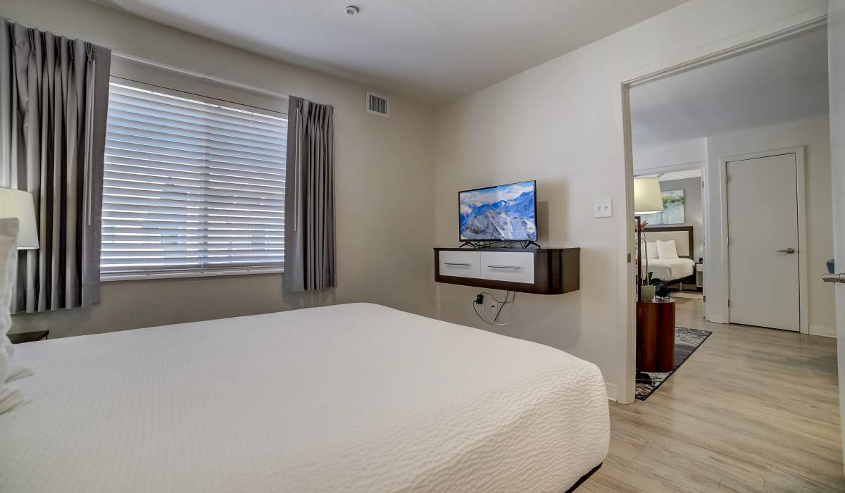 Bedroom showing hallway to living space Simplicity at the Rim in San Antonio, Texas
