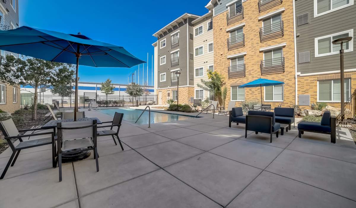Poolside seating Simplicity at the Rim in San Antonio, Texas