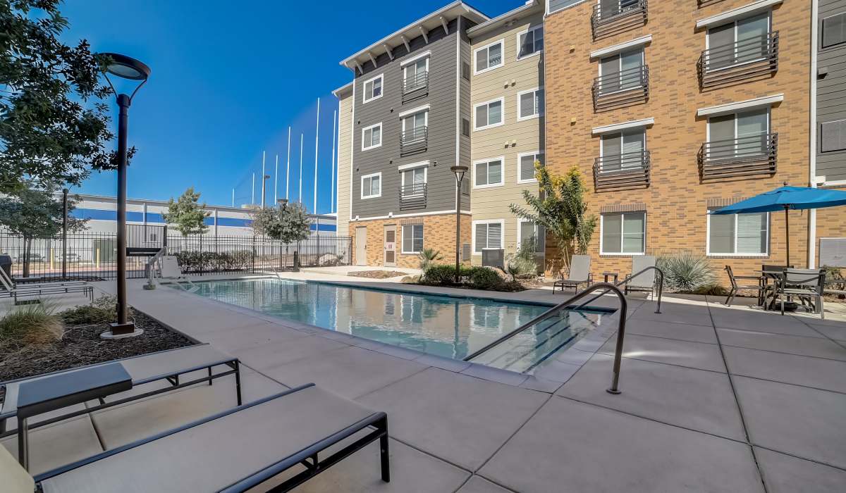 Poolside seating Simplicity at the Rim in San Antonio, Texas