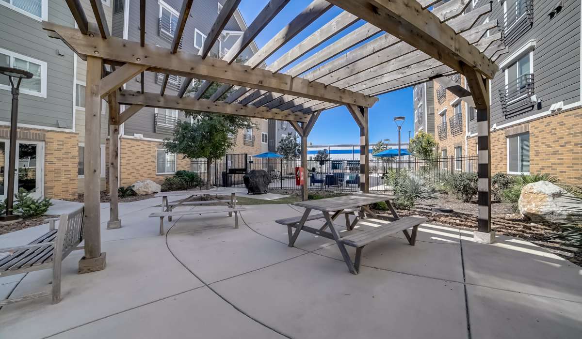 Exterior seating with picnic table Simplicity at the Rim in San Antonio, Texas