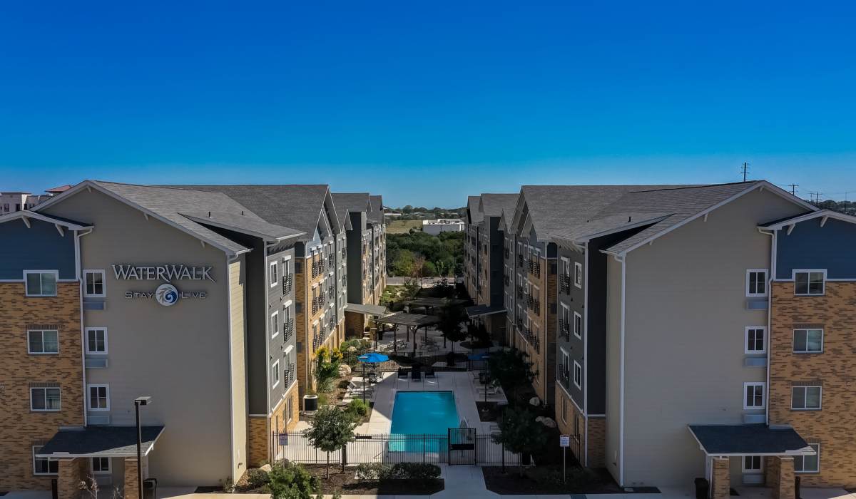Aerial view of apartments and pool Simplicity at the Rim in San Antonio, Texas