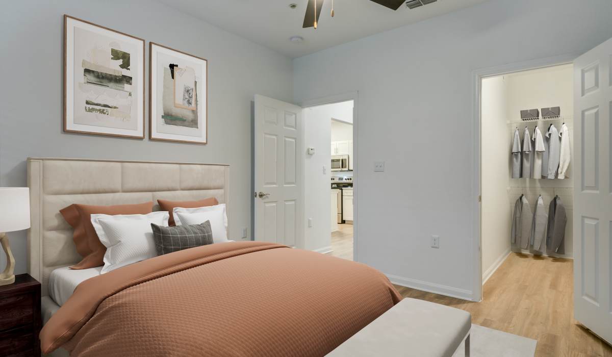 Bedroom with walk-in closet at Sole at Citrus Park in Tampa, Florida