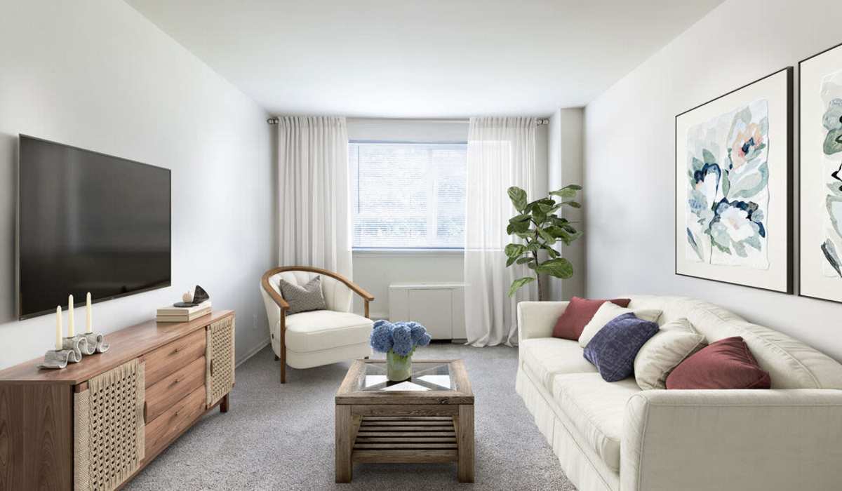 Living room with TV at Three Chopt West Apartments in Henrico, Virginia