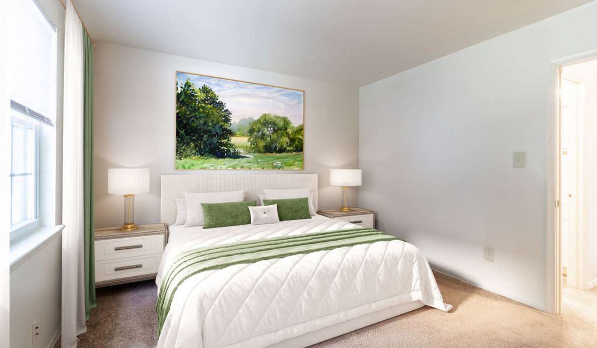 Cozy bed at Southgate Manor in Elizabeth City, North Carolina