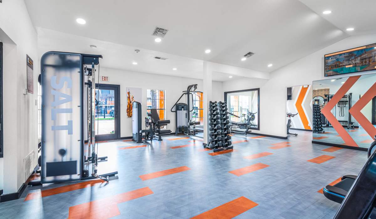 Renovated Fitness Center with modern equipment at Knowlton Apartment Homes in Mesquite, Texas