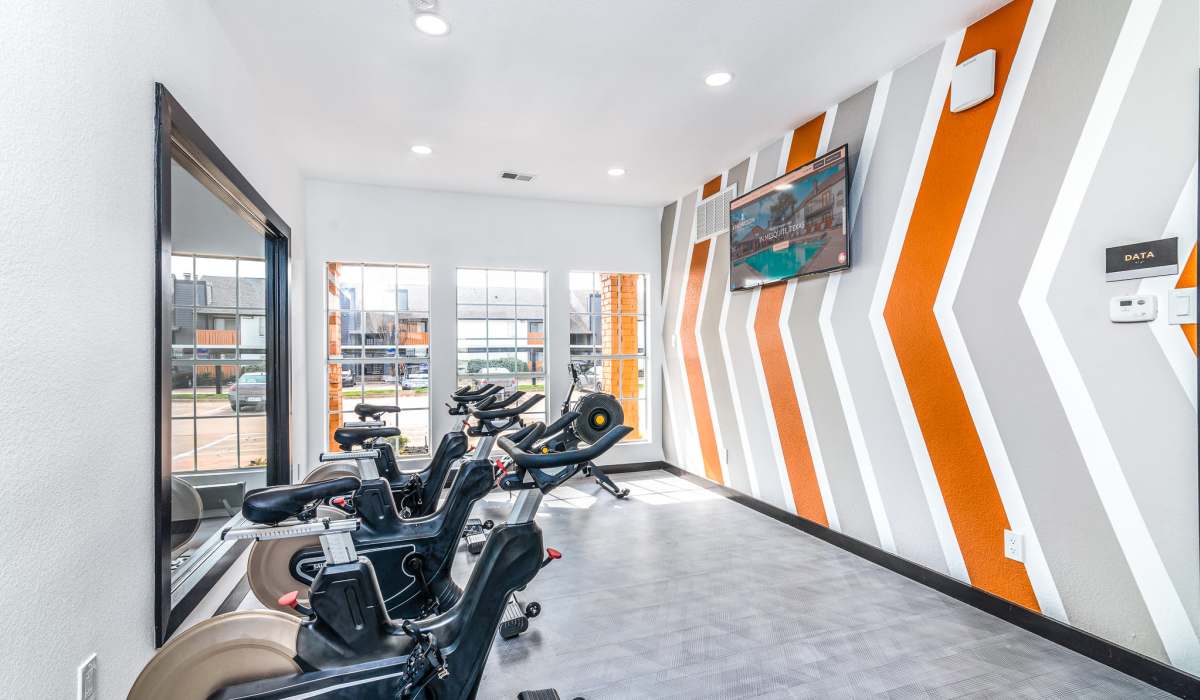 Renovated Fitness Center with Spin Bikes at Knowlton Apartment Homes in Mesquite, Texas