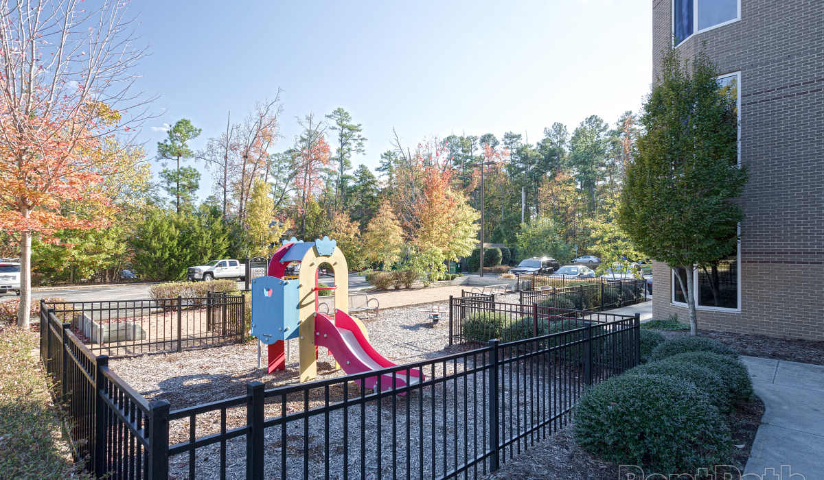 A gated on-site playground at Environs Lofts at East 54 in Chapel Hill, North Carolina
