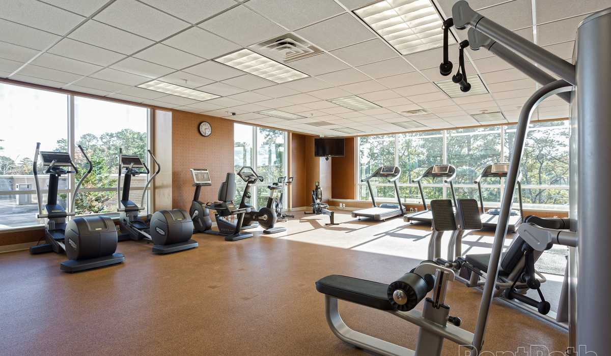 A row of ellipticals in the fitness center at Environs Lofts at East 54 in Chapel Hill, North Carolina
