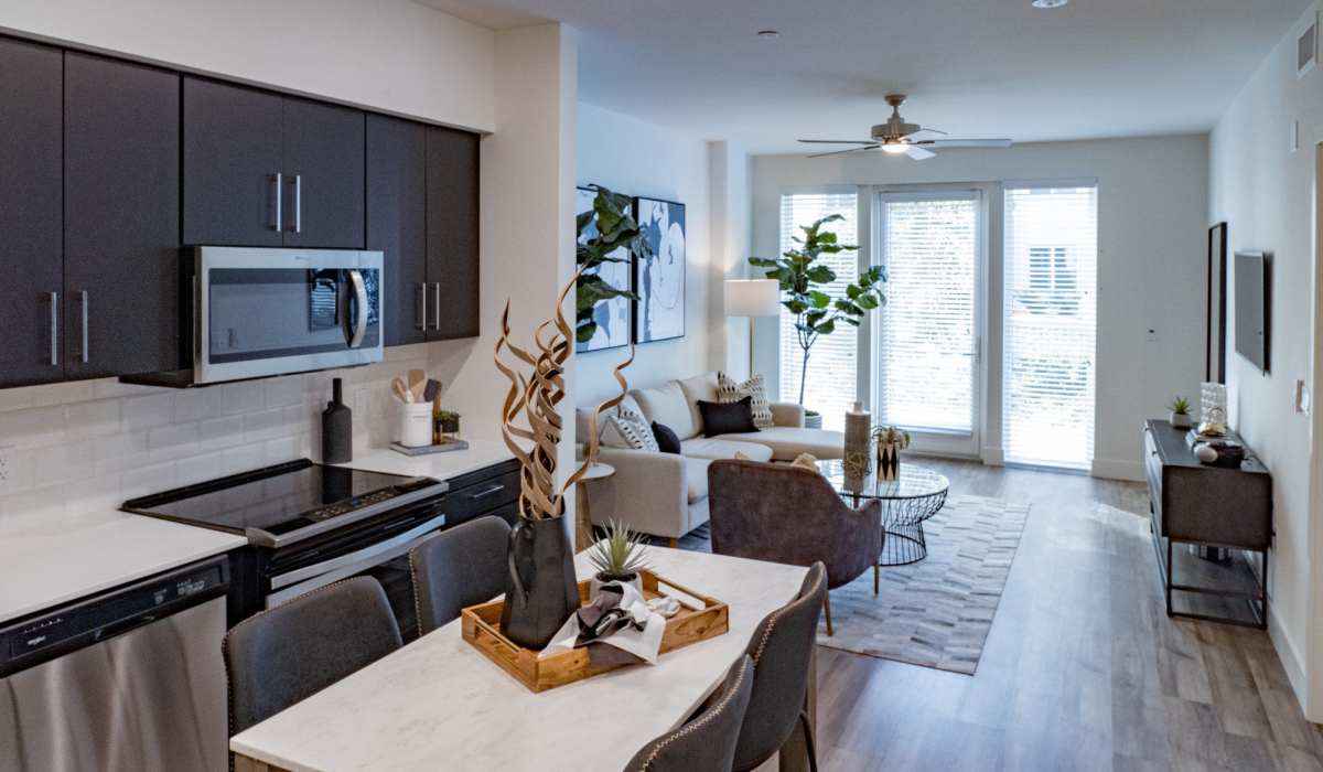Dining room and kitchen at The Dylan Apartment Homes in Hercules, California