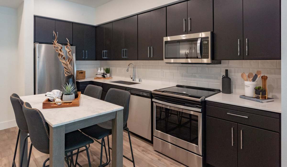 Kitchen Island and kitchen at The Dylan Apartment Homes in Hercules, California