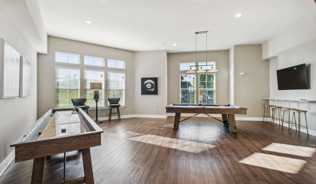 Clubhouse rec room with shuffle board and billiard tables at The Standard at Pinestone in Travelers Rest, South Carolina