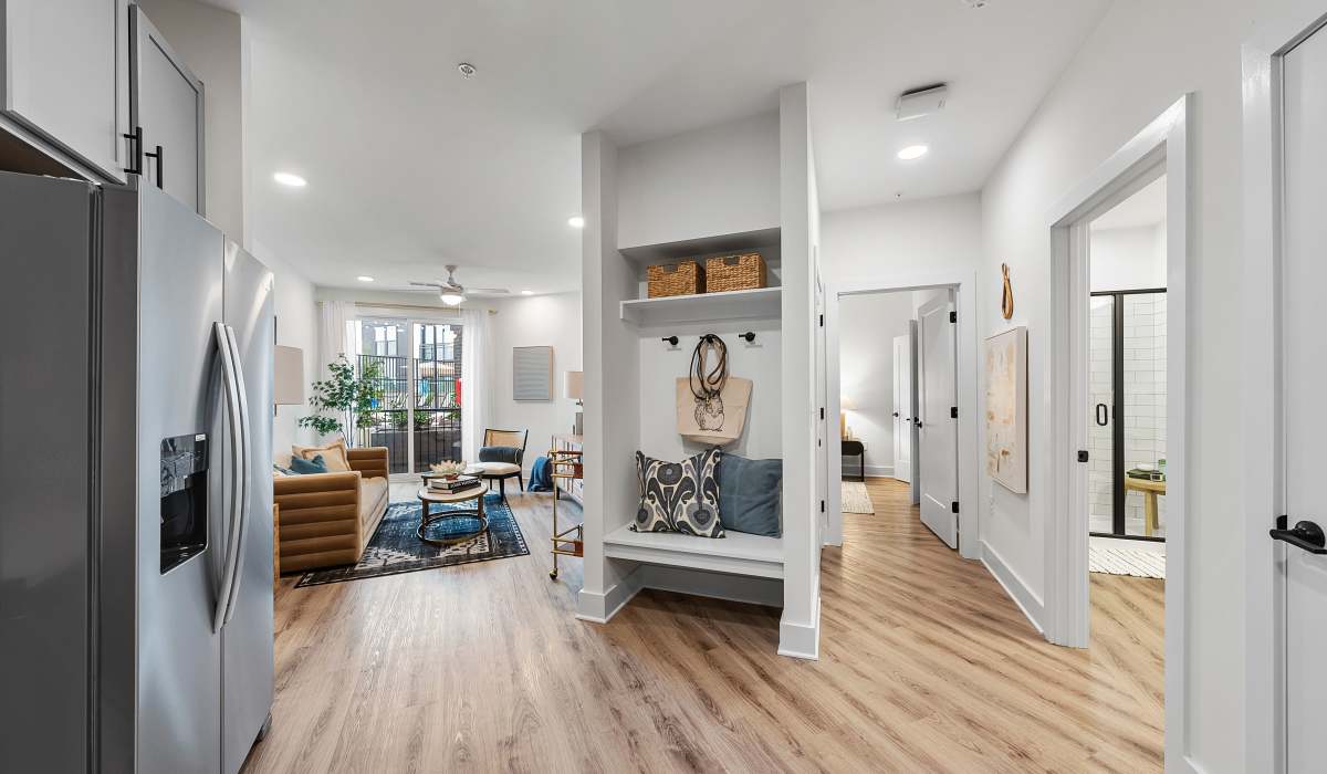 Kitchen with view to bedroom and living room at The Acorn on Person Street in Raleigh, North Carolina