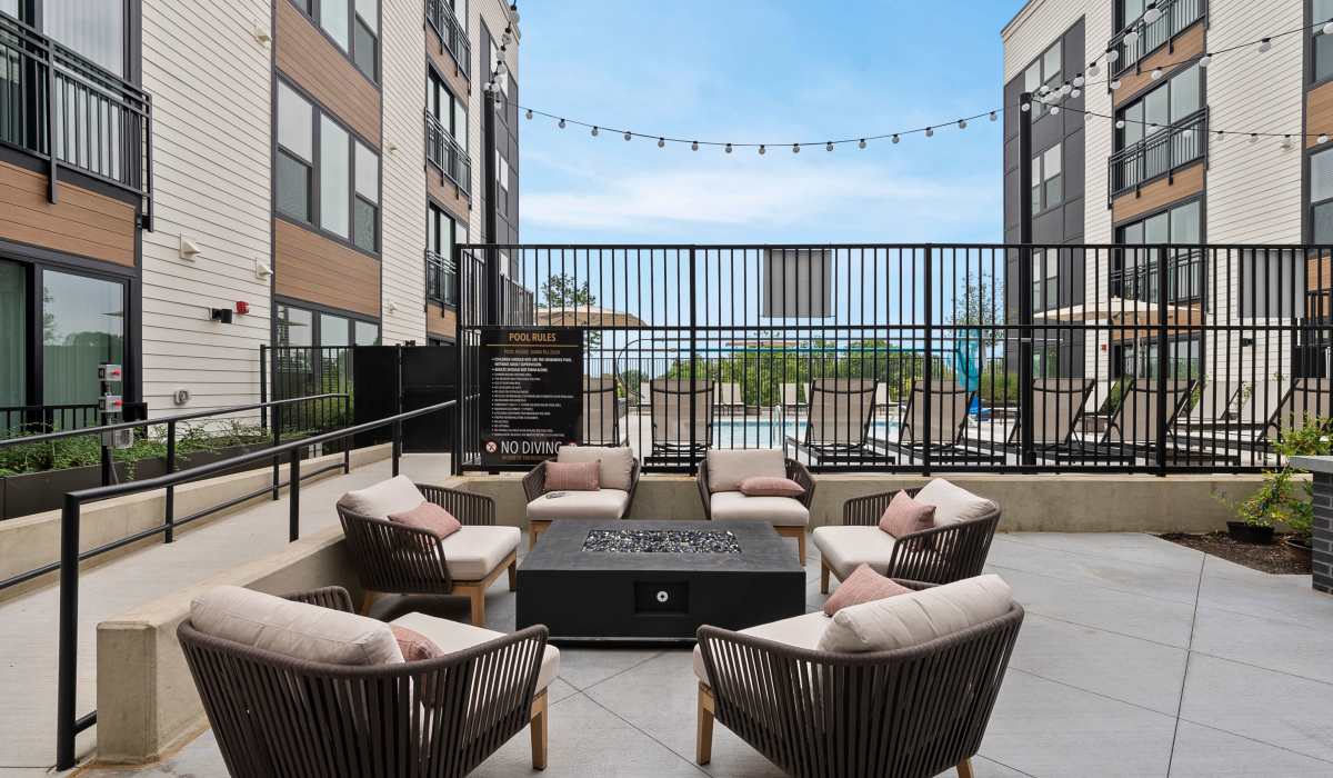 Rooftop seating area with fire pit at The Acorn on Person Street in Raleigh, North Carolina