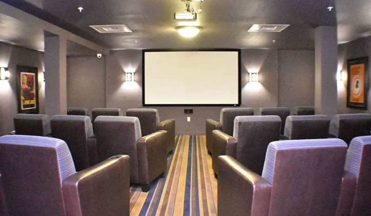 Theater room with comfortable couch at Traditions at Englewood in Englewood, Colorado