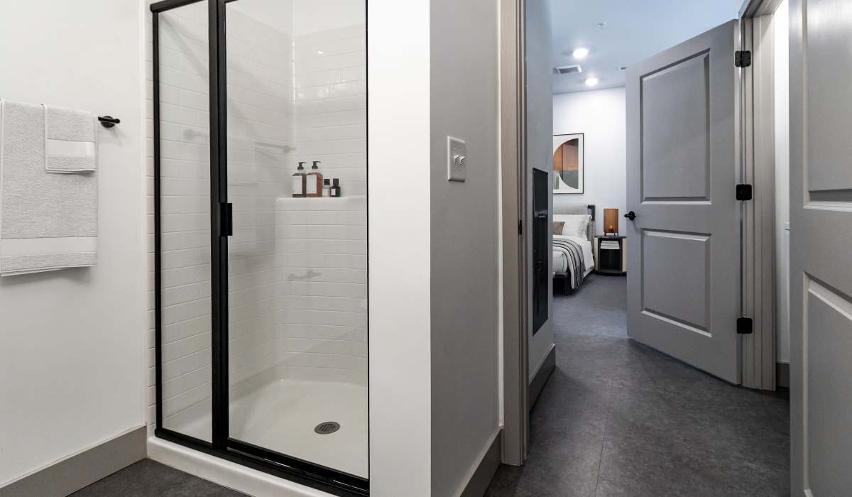 Bathroom and hallway in a model home at Sphere Apartments in Richmond, Virginia