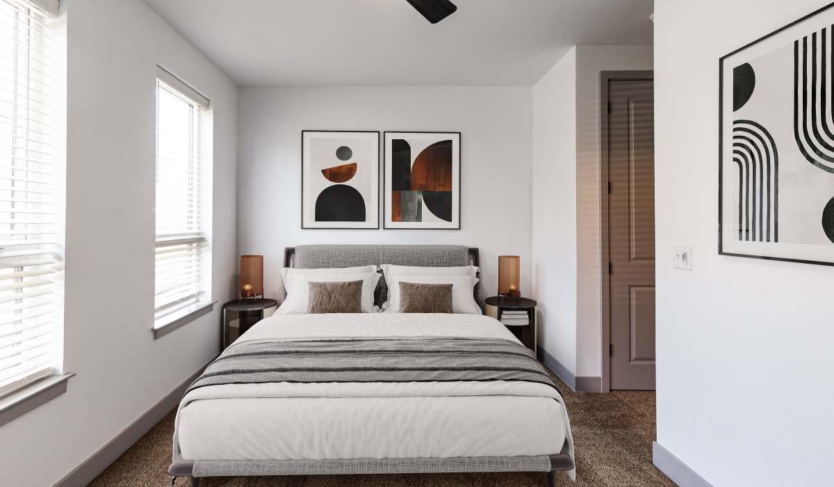 Bedroom with plenty of natural lighting in a model home at Sphere Apartments in Richmond, Virginia