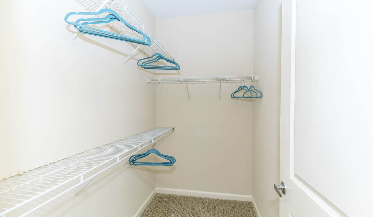 Walk in Closet at The Reserve at Johns Creek Walk in Johns Creek, Georgia