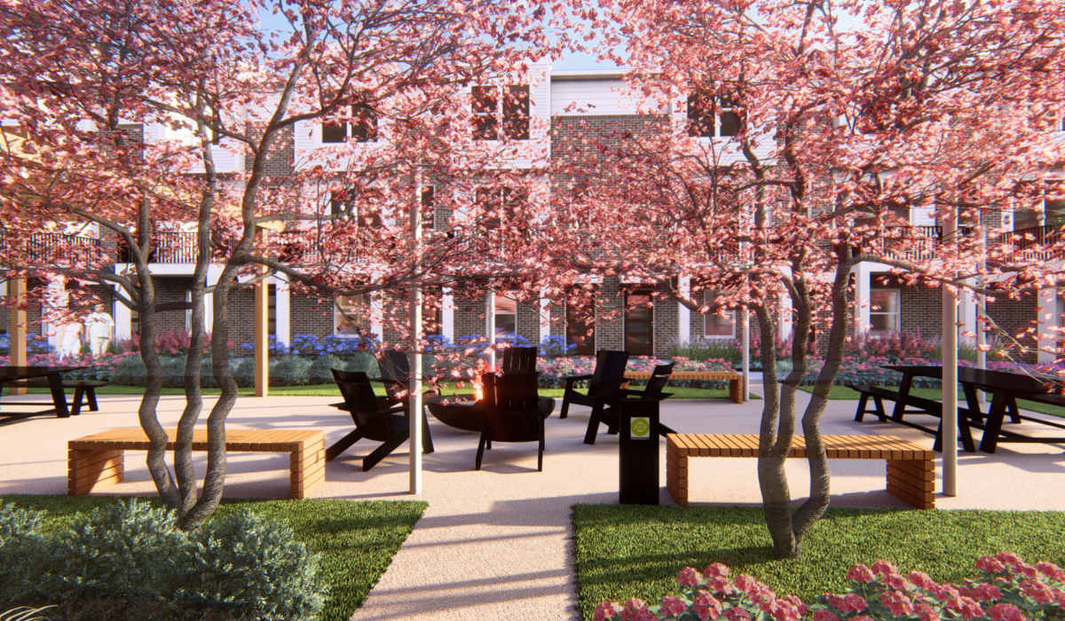 A rendering of an outdoor courtyard with benches and trees in bloom at The Residences at Sakura Novi in Novi, Michigan