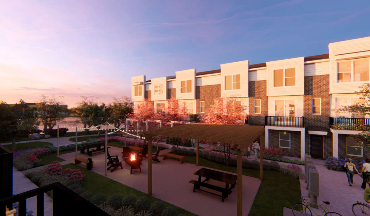  A rendering of an outdoor walkway with a pergola, benches and trees at The Residences at Sakura Novi in Novi, Michigan