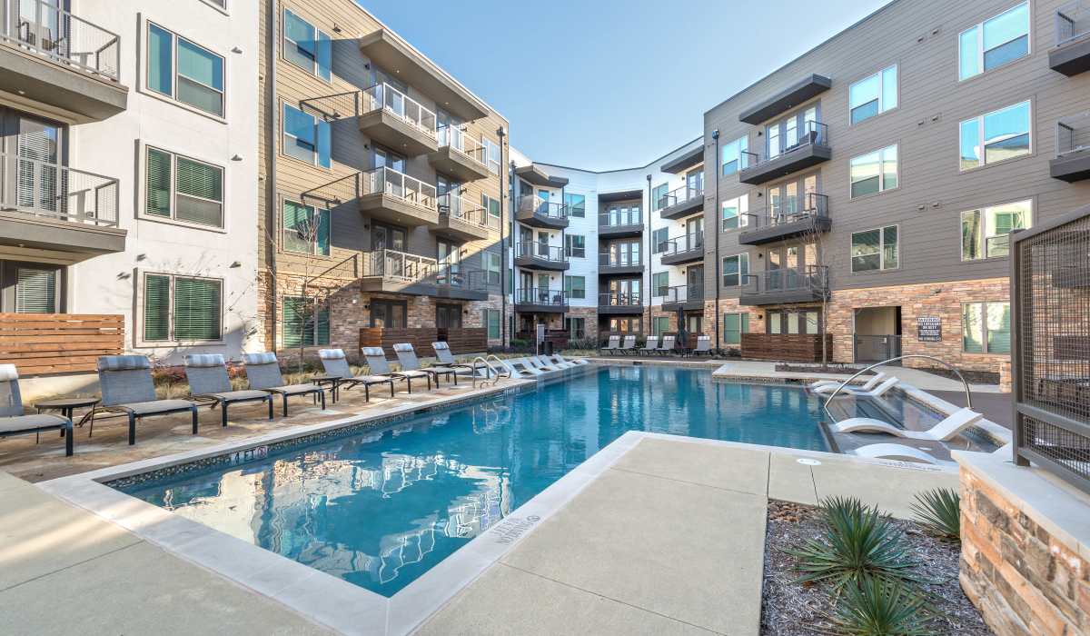 Sparkling swimming pool at The Lucas Apartments in Dallas, Texas