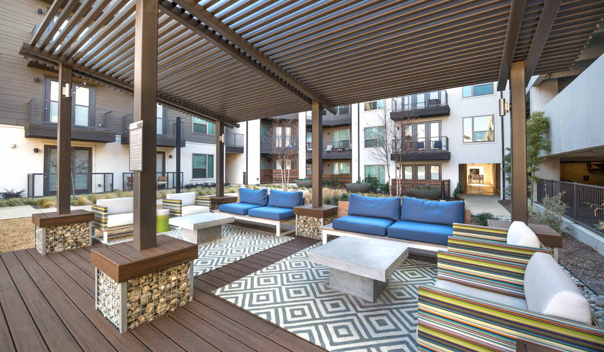 Spacious sitting area in community clubhouse at The Lucas Apartments in Dallas, Texas