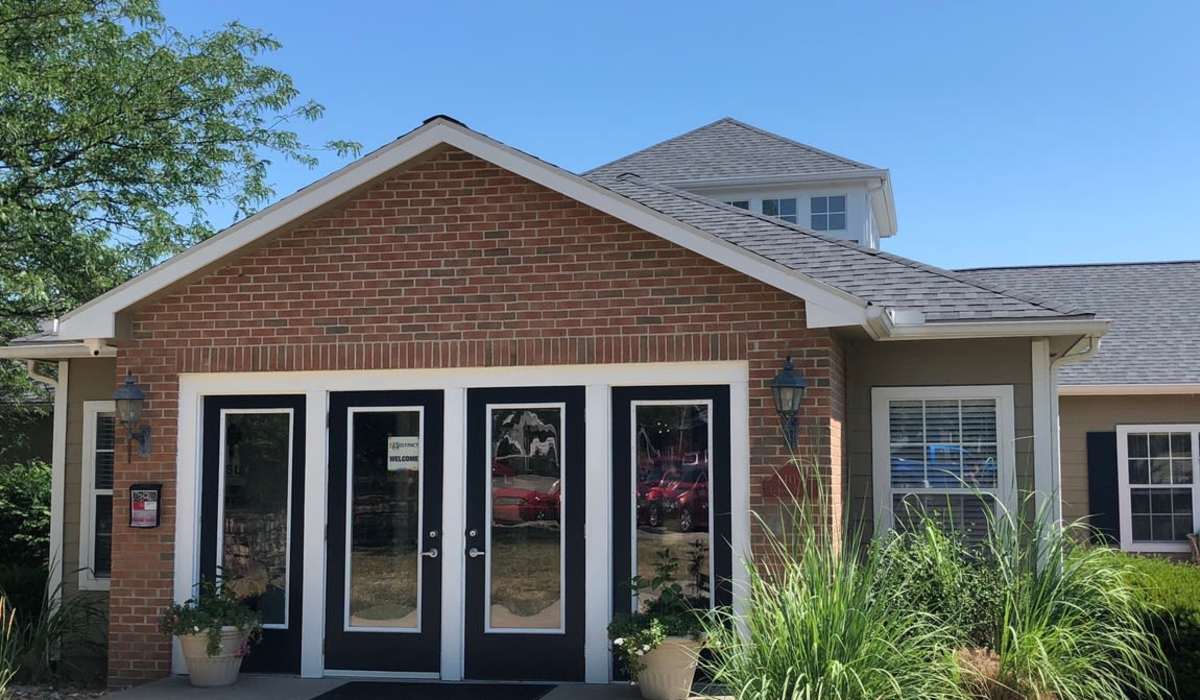 Outside of the leasing office at The District At Manhattan Apartments in Manhattan, Kansas