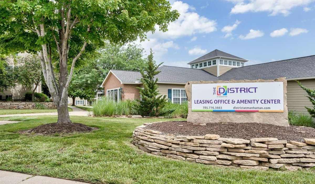 Front entrance sign at The District At Manhattan Apartments in Manhattan, Kansas