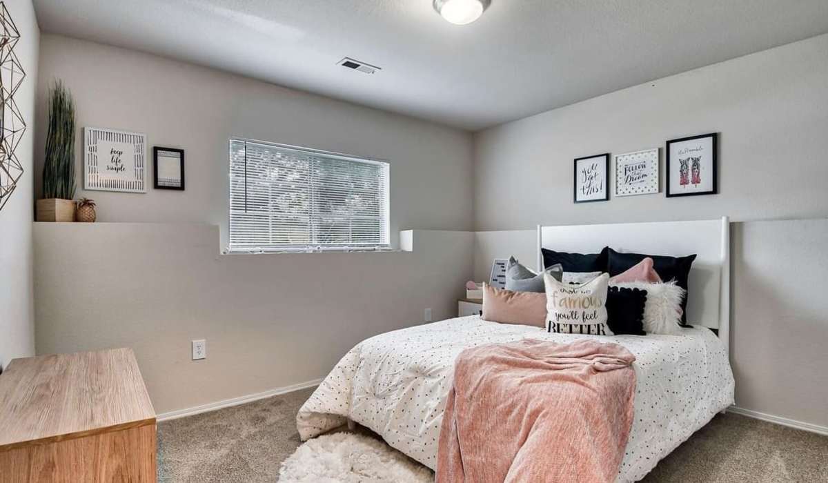 Master bedroom in a home at The District At Manhattan Apartments in Manhattan, Kansas