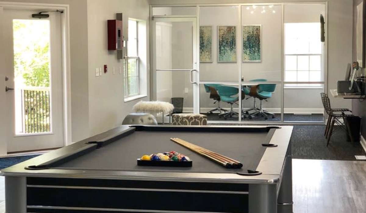 Pool table in the community room at The District At Manhattan Apartments in Manhattan, Kansas