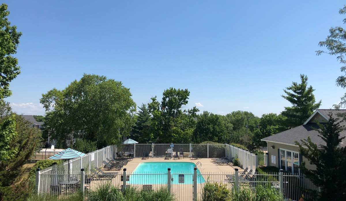 Birds eye view of the pool at The District At Manhattan Apartments in Manhattan, Kansas