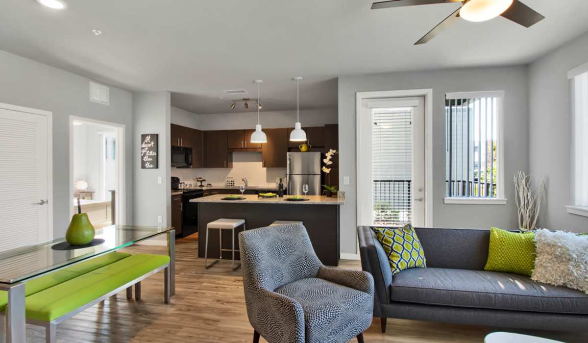A complete view of the living room as well as the kitchen at VerraWest in Longmont, Colorado