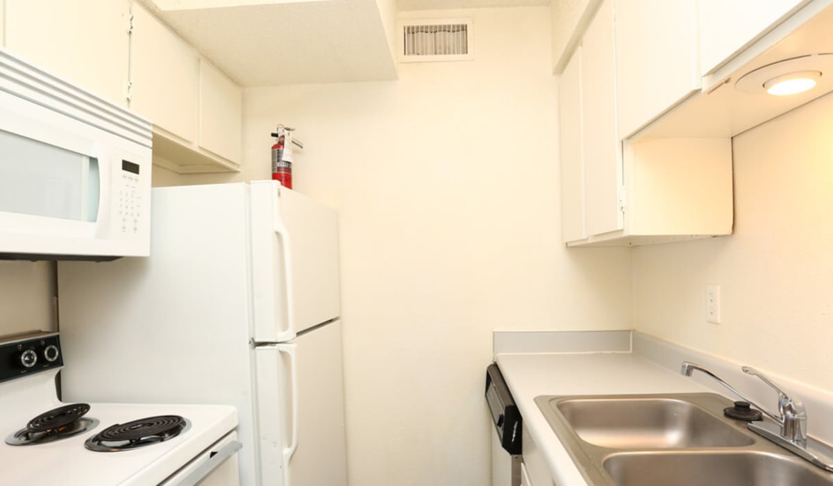 Model kitchen with white walls at Taft Haus in Wichita Falls, Texas