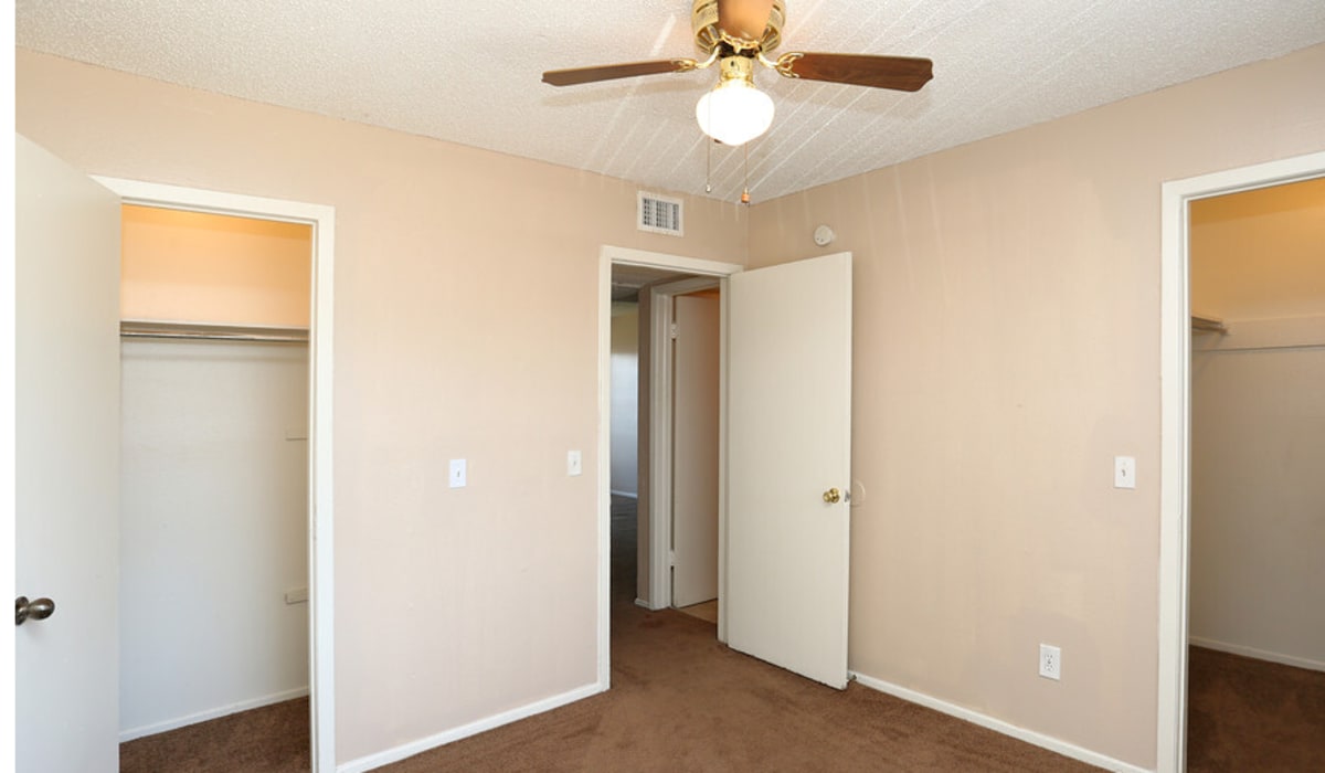 Model bedroom with white walls at Taft Haus in Wichita Falls, Texas