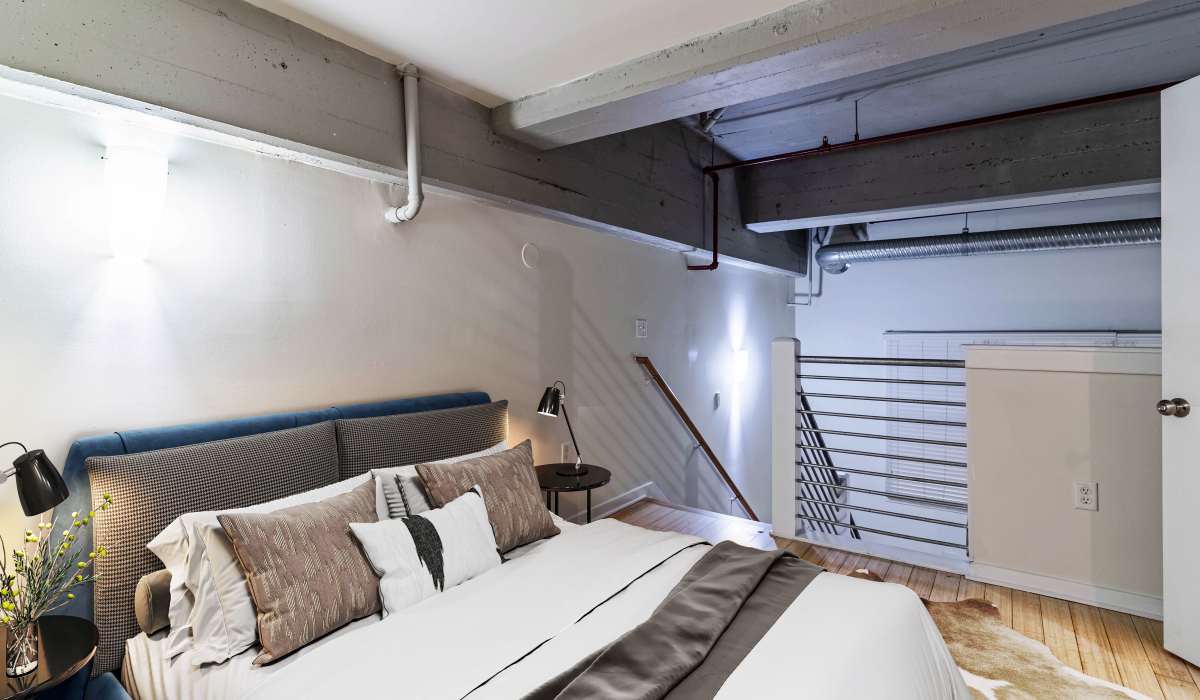 bed in loft at District Square Apartments in Richmond, Virginia