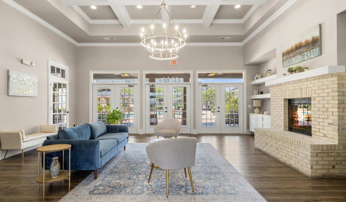  Clubhouse with large windows and a comfortable couch at Ansley Place in Houma, Louisiana