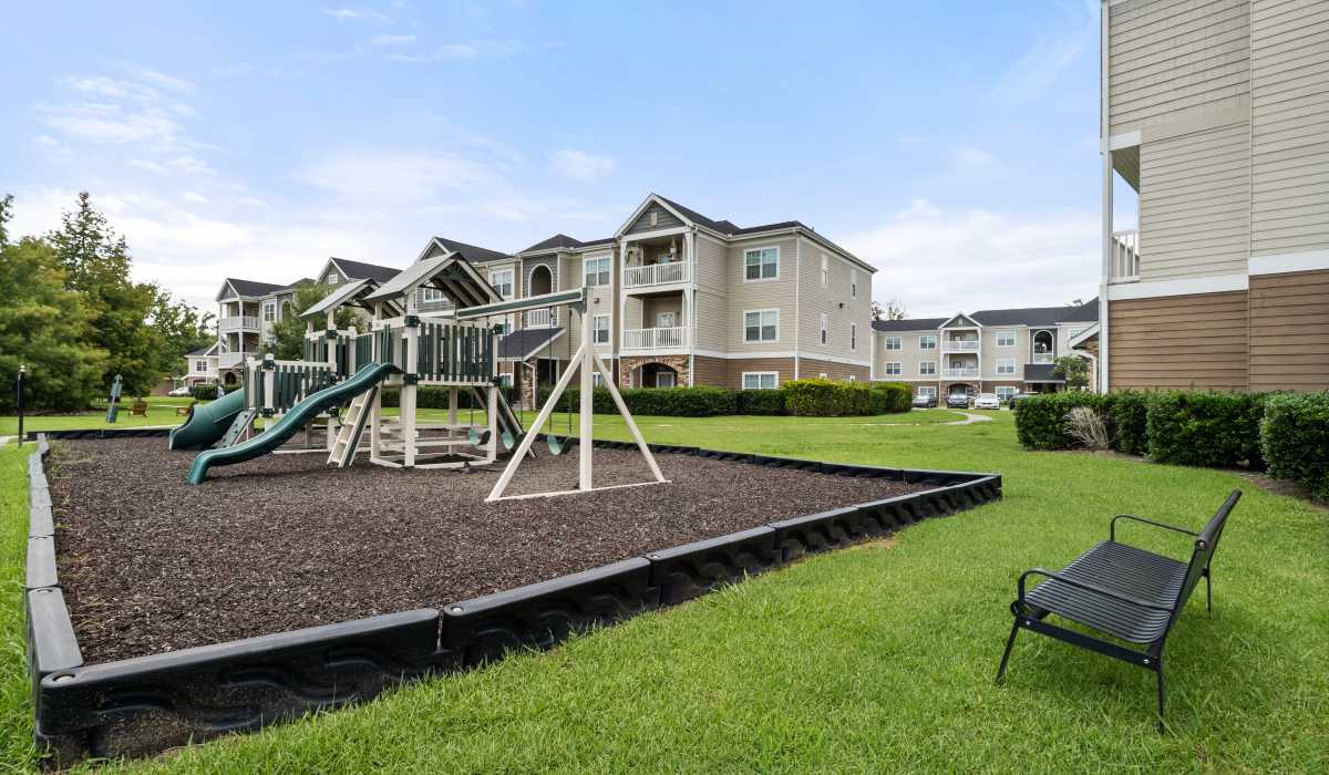  Kids play area with a bench, slide at Ansley Place in Houma, Louisiana