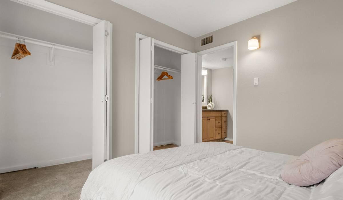 A bathroom with a mirror, commode and a bath tub at Bayberry in Lake Charles, Louisiana