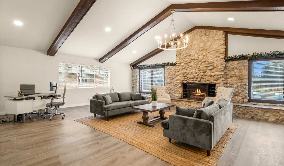 Living room with chair, sofa and coffee table at Celeste in Lake Charles, Louisiana