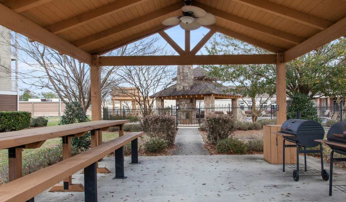 Seating area along with grills at Ansley Place in Houma, Louisiana
