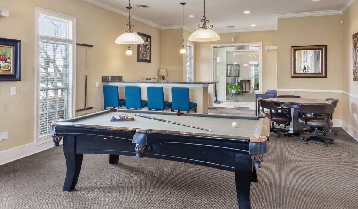Community game room with a pool table at Ansley Place in Houma, Louisiana