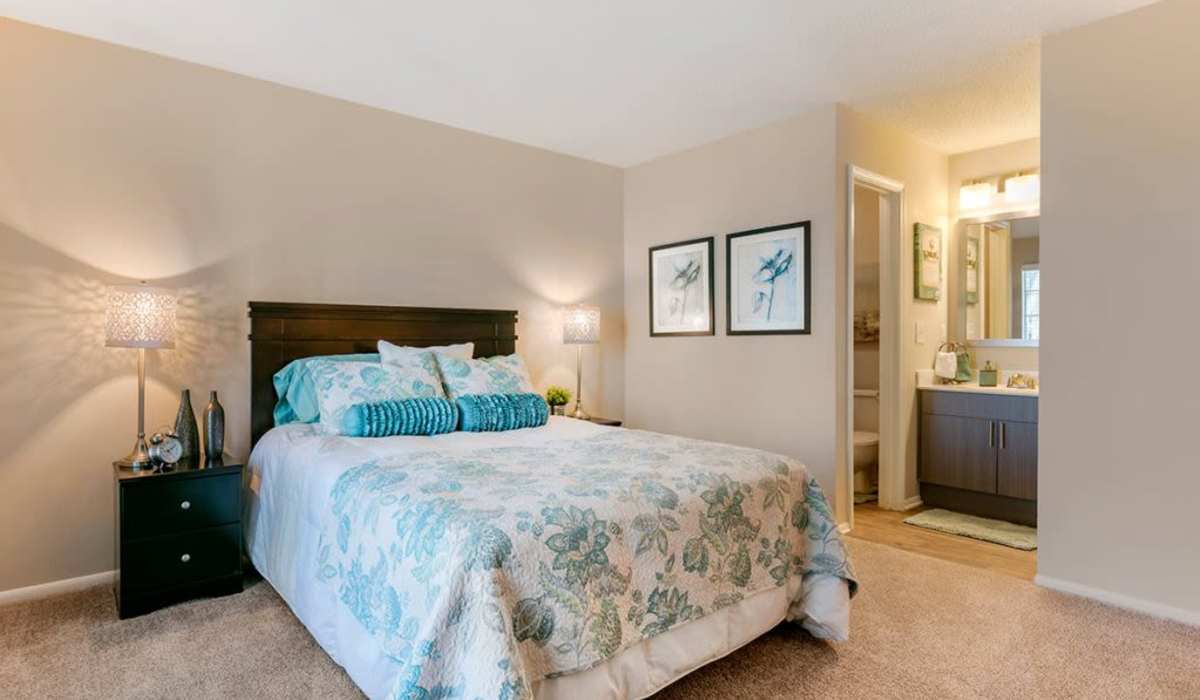 Bedroom with attached bathroom at Commons at University Square in Charlotte, North Carolina