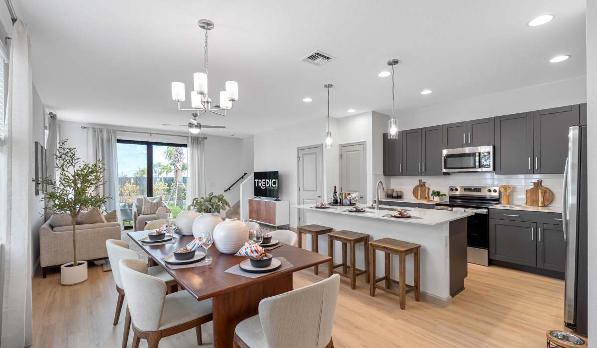 Kitchen showcasing a dining table at Tredici at Central Park in Port St. Lucie, Florida