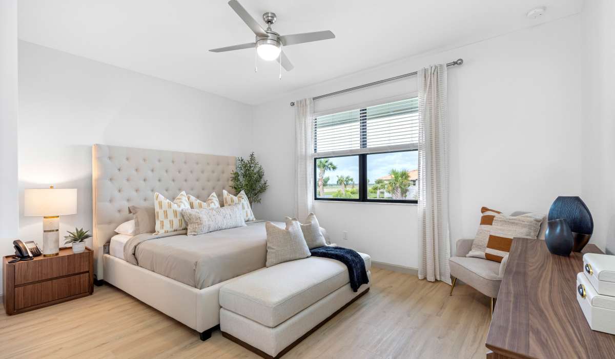 Spacious and well-lit bedroom at Tredici at Central Park in Port St. Lucie, Florida