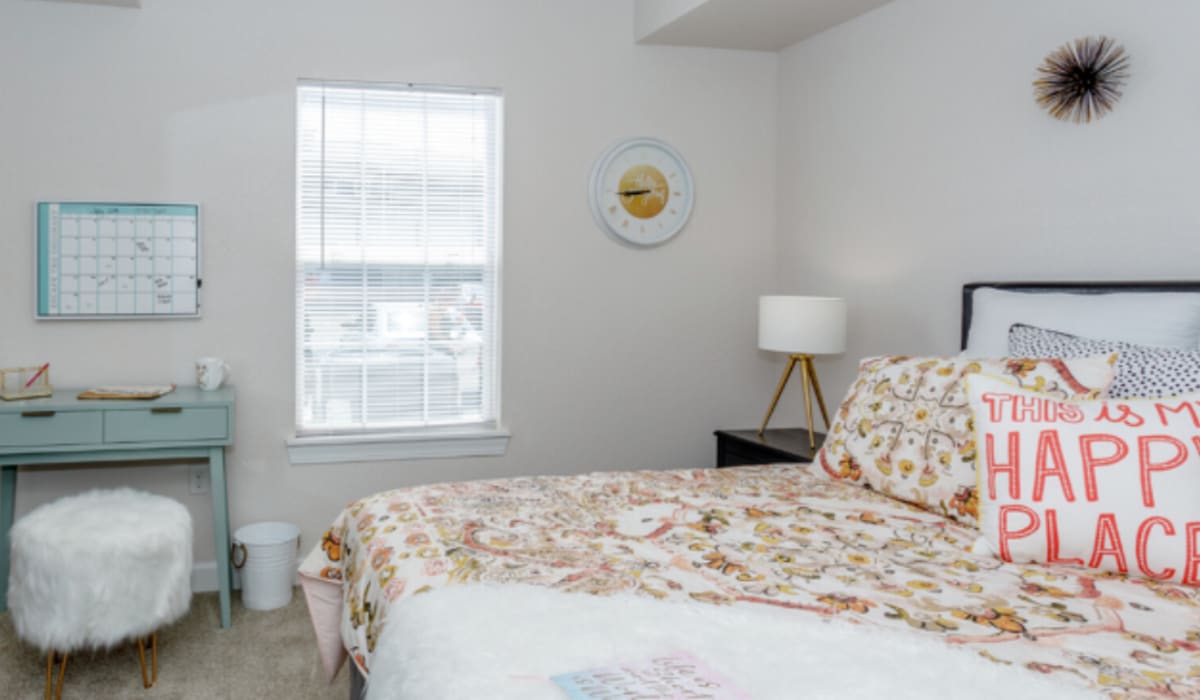 Model bedroom with walls at The Pointe On College Avenue in Manhattan, Kansas