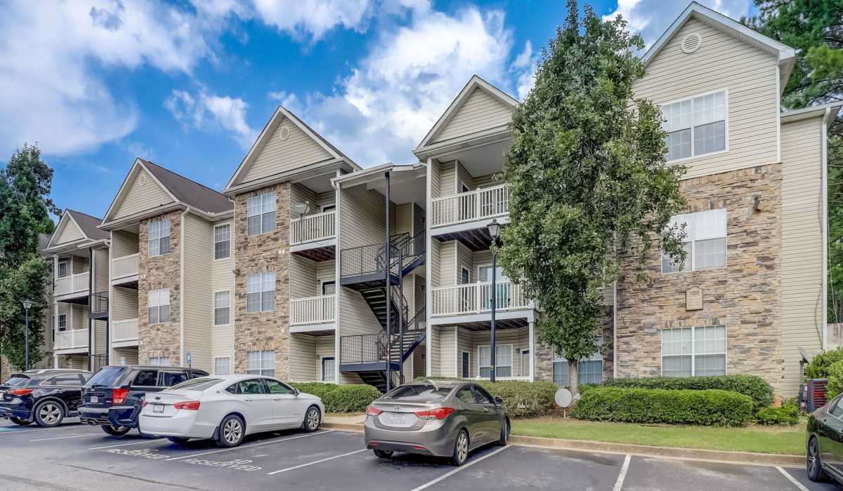 Apartment exterior view from the parking lot at  Parkway Grand in Decatur, Georgia