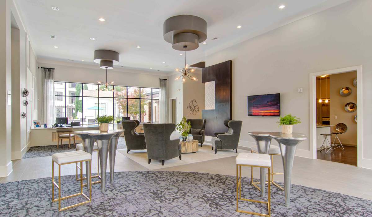 Multiple seating options in the community clubhouse at Twenty25 Barrett in Kennesaw, Georgia